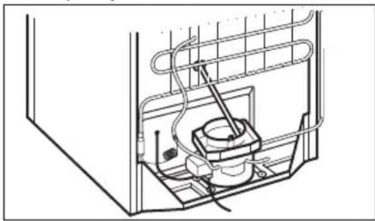 Line drawing of an appliance interior showing a cooling rack, insulation layer, and electrical connections (no text or symbols).