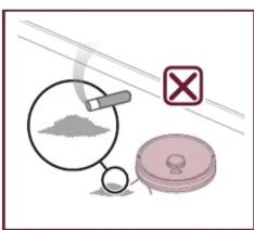 Illustration d'avertissement de sécurité montrant une loupe inspectant un tas de matériau avec un symbole X rouge et un dispositif circulaire rose.