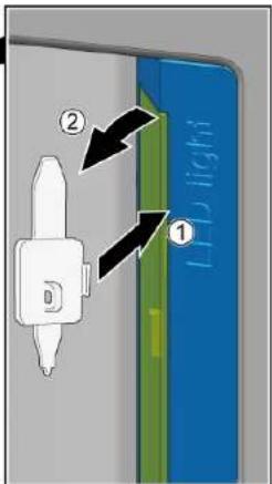 Diagram showing a device with labeled parts and directional arrows, likely illustrating a process or assembly.