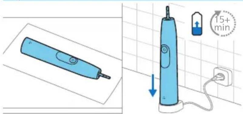 Diagram showing a blue electric toothbrush and its 15-minute charging station connected to a power outlet, with a magnified view of the device's charging setup.