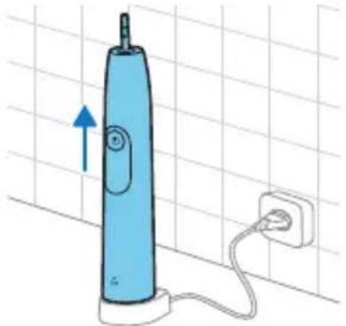 Illustration of a blue electric toothbrush with a power outlet, placed on a grid background (no text or symbols)