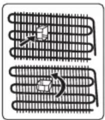 Diagram of two coiled heat exchangers with heating elements (no text or labels)