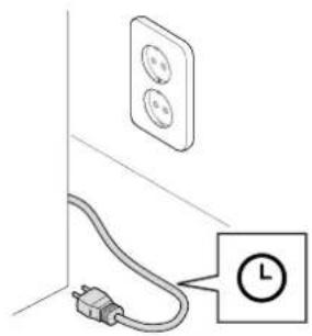 Simple line drawing of an electrical outlet with a plug and clock icon (no text or symbols)