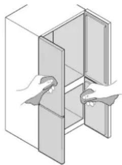 Illustration of two hands inserting a door into a cabinet (no text or symbols)