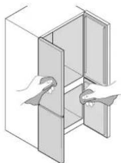 Diagram of a door with two hands inserting or adjusting a component (no text or symbols)