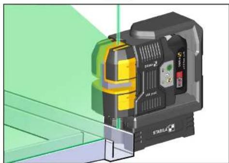 3D rendering of a mechanical device with yellow and black components, mounted on a green surface (no visible text or symbols)