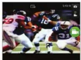 Action shot of NFL players competing for the ball on a field (no visible text or symbols)