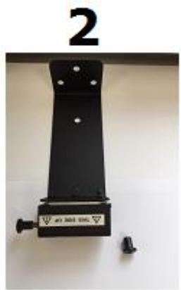 Black metal support bracket with mounting holes and a small screw, mounted on a white wall (no visible text or symbols)