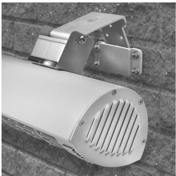 Exterior view of a modern security camera with ventilation grille and mounted frame (no text or symbols visible)
