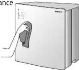 Illustration of a white industrial appliance with a handle and control panel (no text or symbols visible)