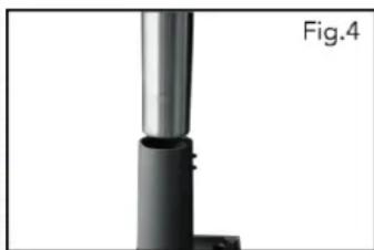 Close-up of a metallic cylindrical object with a black base and small protrusion, labeled 'Fig.4' in the corner (no other text or symbols)