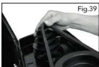 Close-up of a hand holding a coiled spring component, no visible text or symbols