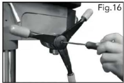 Close-up of hands using a tool to adjust or install a mechanical component, labeled 'Fig.16' (no text on the diagram itself)