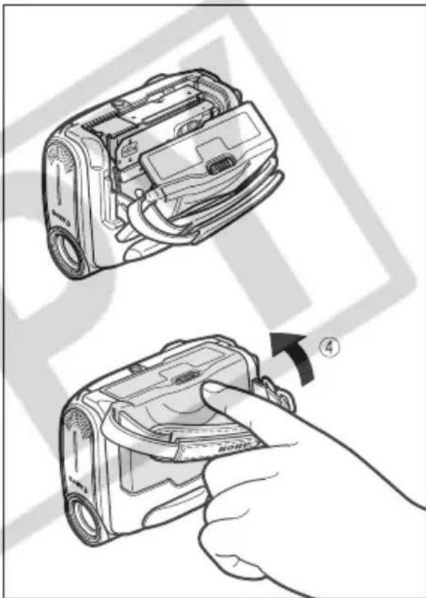 Illustration of a hand inserting a digital camera into a device, showing the process (no text or symbols present)
