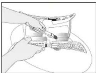 Illustration of hands using a tool to examine a mechanical component (no text or symbols visible)