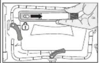 Diagram showing a hand holding a device with a lock and directional arrow, likely illustrating a mechanical or electrical component.