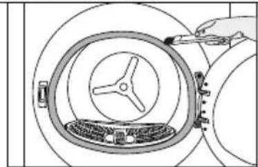 Diagram of a hand inserting a component into a circular housing with a central wheel (no text or symbols)
