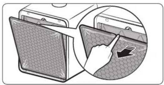 Illustration of a device with a magnified view showing a hand interacting with a grid-patterned panel (no text or symbols present)