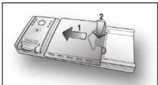 Diagram of a device with labeled parts and directional arrow indicating movement or force