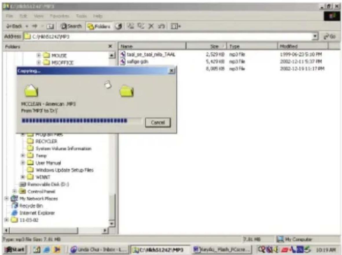 C:\ch51242\MP3 File Edit View Favorites Tools Help UnBack Search Folders Address C:\ch51242\MP3 Folders Name Size Type Modified MOUSE taal_se_taal_nilo_TAAL 2,529 KB np3 file 1999-06-23 5:10 PM MSOFFICE safige.gdn 5,429 KB np3 file 2002-12-11 5:37 PM 8,005 KB np3 file 2002-12-19 11:17 PM Copying...…