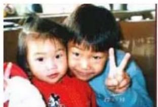 Two children posing with one making a peace sign (no visible text or symbols)