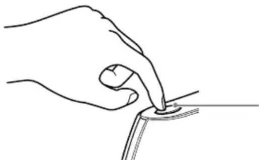 Line drawing of a hand holding a small object near a surface (no text or symbols)