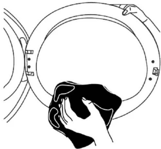 Line drawing of a hand cleaning a circular object with a magnified inset (no text or symbols)
