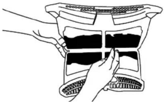 Illustration of hands holding a computer monitor with a grid screen (no text or symbols visible)