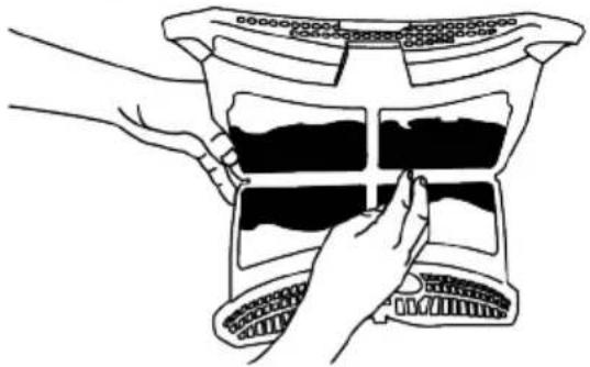 Illustration of hands holding a device with a grid pattern (no text or symbols)