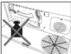 Diagram of a refrigerator interior showing fan, grille, and door (no text or labels)