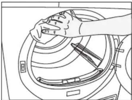 Line drawing of a hand cleaning a washing machine drum (no text or symbols)