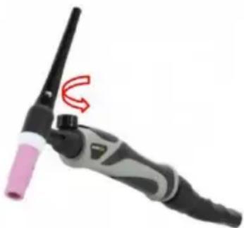 Close-up of a welding torch with a pink handle and black tip, showing a red curved arrow indicating motion (no text or symbols)