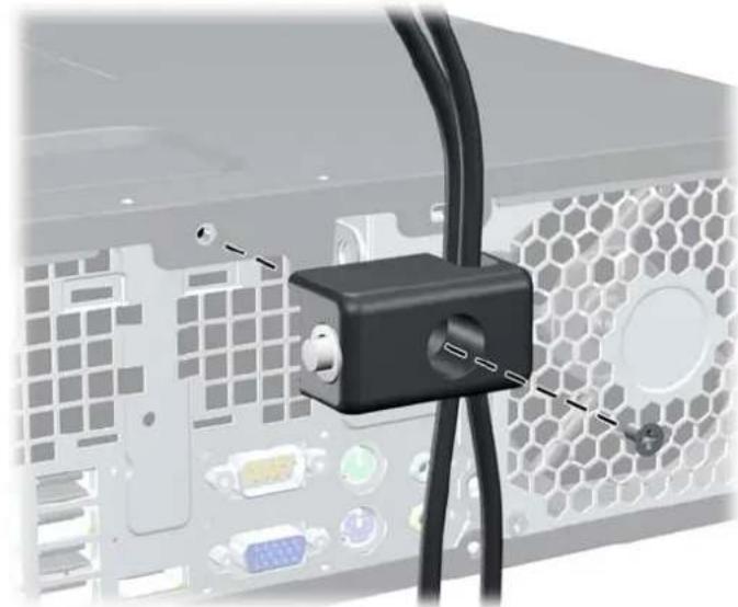 Close-up of a black cable connector inserted into a server rack with multiple drive bays and ventilation grilles (no visible text or symbols)