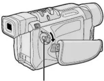 Illustration of a digital camera with a scroll wheel and handle, showing internal components (no text or symbols)