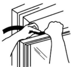 Line drawing of a hand holding a ruler above a stack of books (no text or symbols)
