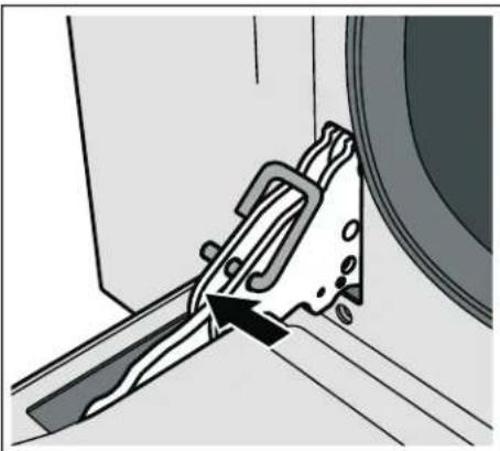 Mechanical assembly diagram showing a tool interacting with a component (no text or symbols visible)
