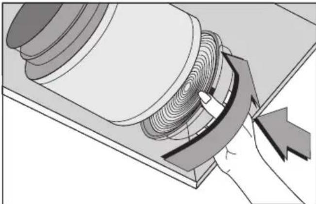 Diagram of a mechanical assembly with a hand holding a curved component, showing internal layered structure (no text or symbols)