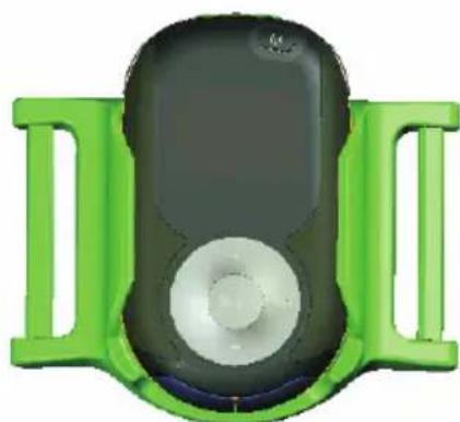 Green and black plastic device with a circular button and blue handle (no text or symbols visible)