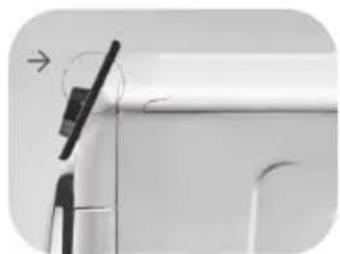 Close-up of a mechanical component with a black lever and circular motion indicator (no text or symbols)