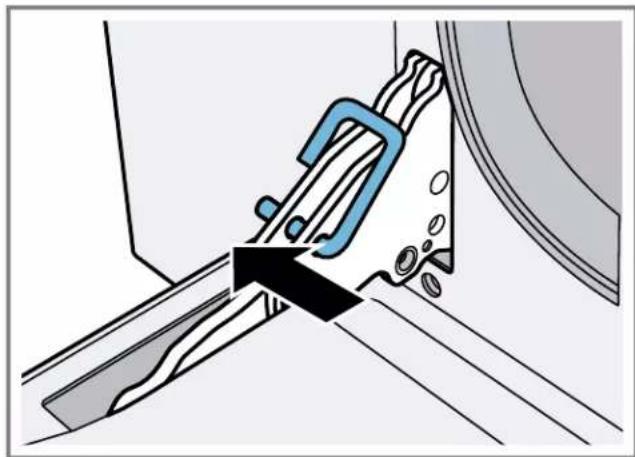 Technical illustration of a mechanical assembly with a blue clamp and metal components (no text or symbols)