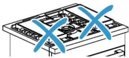 Diagram of a gas stove with blue 'X' marks indicating heating elements (no text or symbols present)