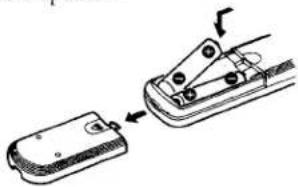Diagram showing a device being inserted into a clip, with arrows indicating the process (no text or symbols present)