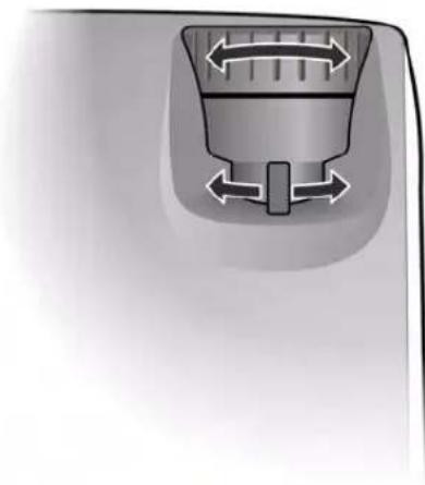 Close-up of a mechanical knob or dial with bidirectional arrows indicating movement (no text or symbols)