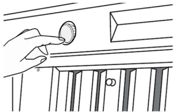 Line drawing of a hand placing a coin on a piano keyboard (no text or symbols)