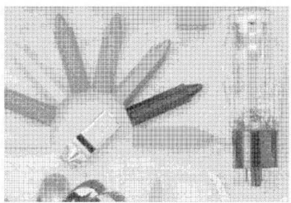 Close-up of a pen tip with spout, no visible text or symbols