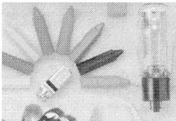 Close-up of a pen and its tip with a magnified view of its tip (no text or symbols visible)