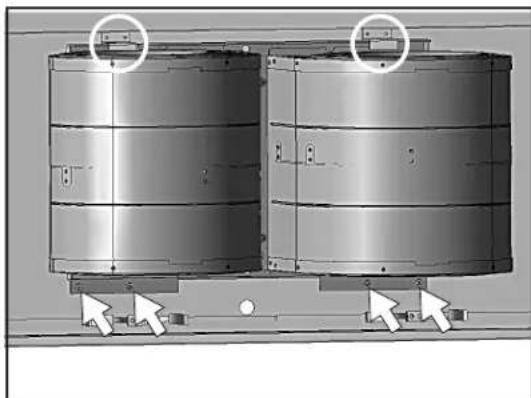Technical diagram of two cylindrical industrial tanks with directional arrows indicating movement or assembly (no text or symbols present)