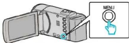 Diagram showing a digital camera with an open lid and a hand cursor clicking the button labeled 'MENU'.