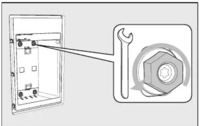Diagram showing a mechanical assembly with a wrench and a bolt, illustrating the process of fastening or fastening.