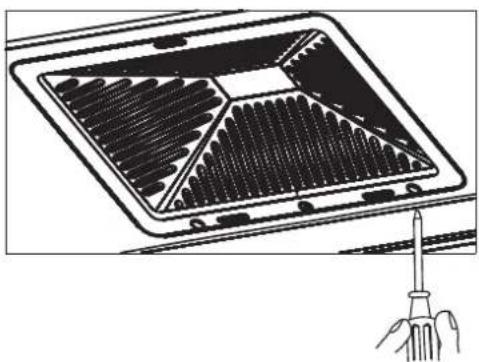 Diagram of a screwdriver inserted into a grid-patterned device (no text or symbols)